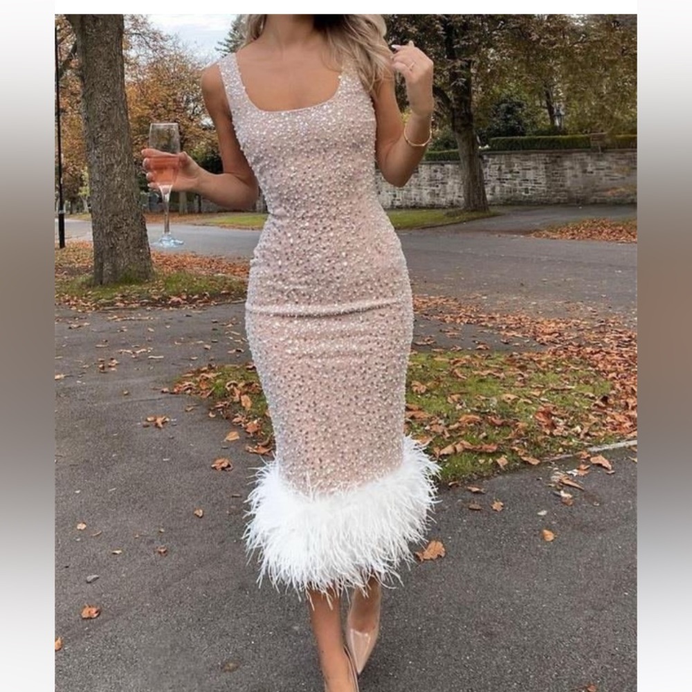 Sexy nude sequin pearl dress with feathers!